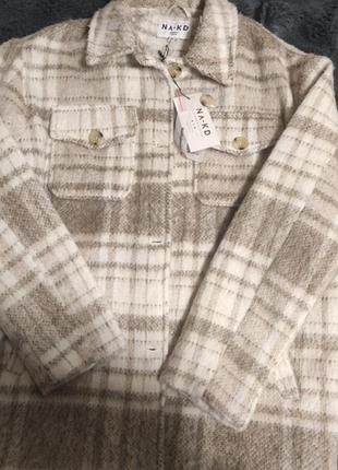 Куртка рубашка демисезонная теплая с подкладкой.длина 72,рукав 59.размер 38.