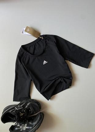 Новий спортивний топ з рукавом