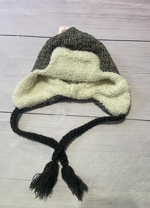 Шапка вушанка вʼязана на хутрі