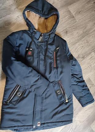 Зимова курточка на підлітка