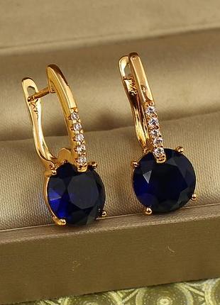Сережки xuping jewelry стрілка з родієм із великим синім каменем 2,7 см золотисті