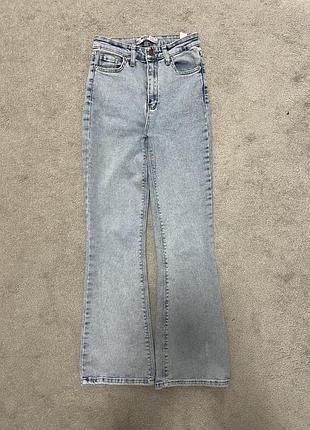 Джинси жіночі нові клеш flared блакитного кольору штани кльош