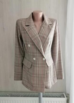 Піджак у клітку з підплічниками