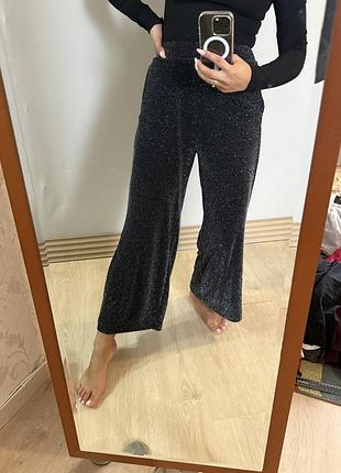 Блискучі широкі штани