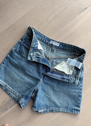 Джинсові короткі шорти з ефектом старіння