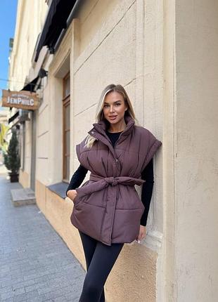Женская жилетка