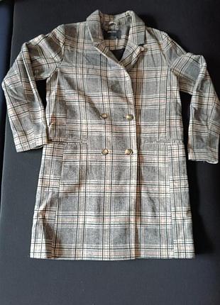 Пальто в клетку sinsay