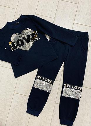 Повсякденний костюм на дівчинку 6-7 років в синьому кольорі з паєтками