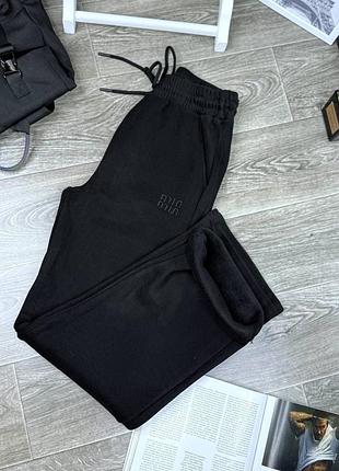 Теплые черные штаны на резинке на флисе 353