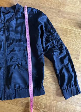 Атласна куртка жіноча з маєтками