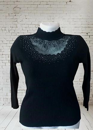 Светр під горло в рубчик з камінцями