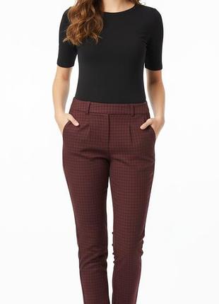 Штани червоні у клітинку