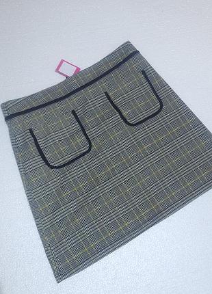 Спідничка міні у клітинку
