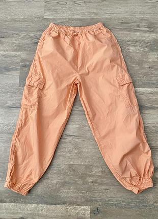 Штани помаранчеві джогери карго на резинці next