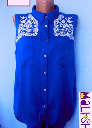 Блуза с вышивкой от бренда tu