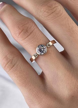 Серебряно-золота кольца с камнем