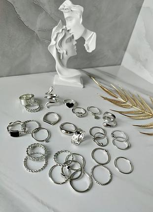 Набір жіночих колечок на пальці в сріблястому кольорі, біжутерія
