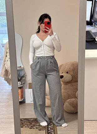 Сірі брюки