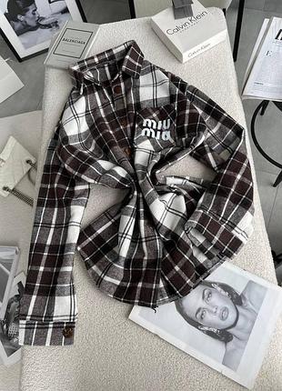 Жіноча кашемірова сорочка у клітинку вільного крою