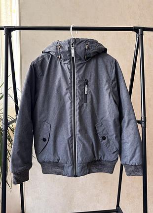 Тепла куртка next 9 років 134 см