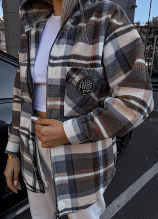 Жіноча тепла флісова сорочка у клітинку на блискавці з капелюхом в кольорах рр 42-48