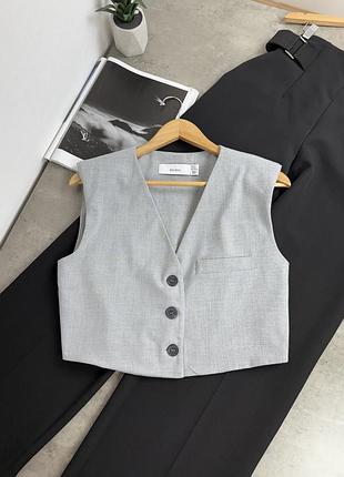 Вкорочена жилетка