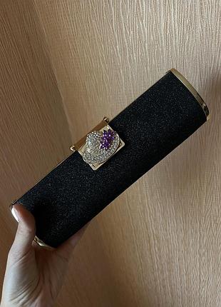 Чорний клатч із золотом та камінням