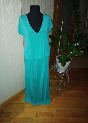 Кардиган бирюзового коляра,
Турецкий трикотаж вискоза, длина регулируэтс 
широкой резинокой с красивым
напуском, можно с делает 
короче, универсально.