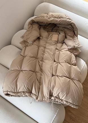 Жіноча жилетка