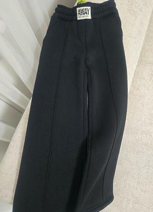 Теплые брюки палаццо на флисе