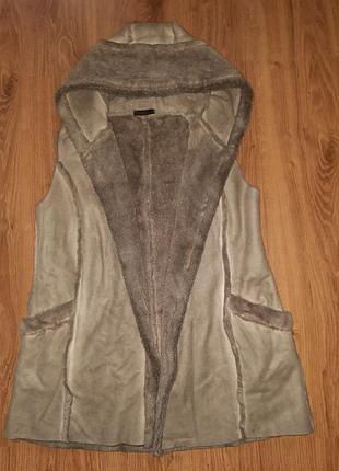 Жилетка тепла