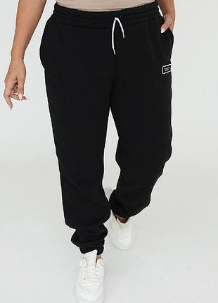 Стильные молодежные женские спортивные штаны с нашивкой "aletta" код 478