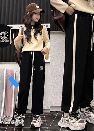 Чорні тепленькі штани на хутрі для хлопців і дівчат якість супер тканина плотна