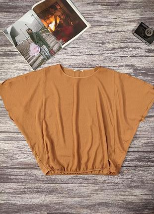 Жіноча блуза вільного крою