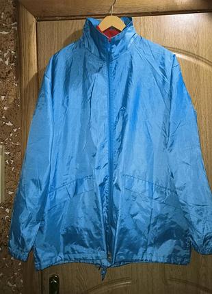 Новый  тонкий дождевик с капюшоном и карманами