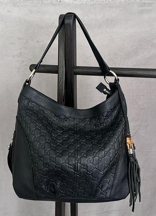 Шкіряна монограмна сумка gucci
