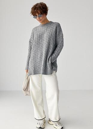 Вязаная туника с косичками