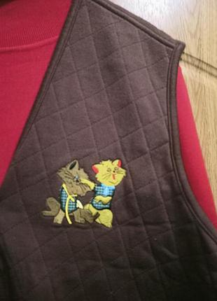 Новая стеганая котоновая жилетка с карманами и вышивкой,48-54размtrend.