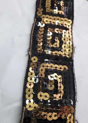 Тесьма 6,20м черная с золотыми пайетками!
ціна за метр 38 грн
