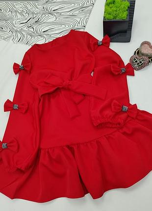 Красивое нарядное платье с бантиками