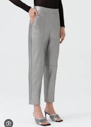 Штани з екошкіри.