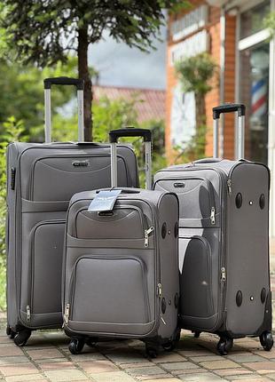 Большой чемодан дорожный тканевый l польша на колесах wings с подшипником