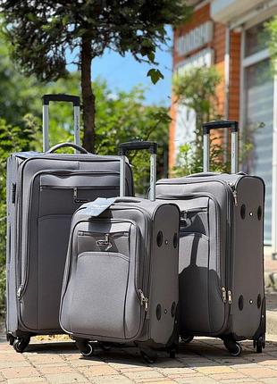 Большой чемодан дорожный тканевый l польша на колесах wings с подшипником