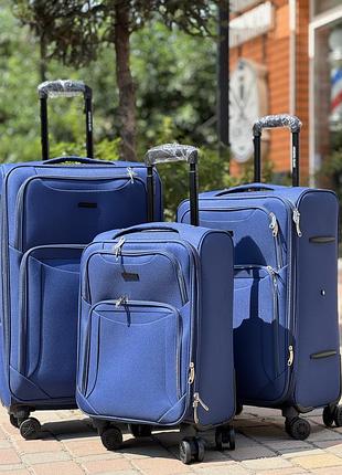 Мала валіза дорожня тканинна s польща на колесах gloria з підшипником