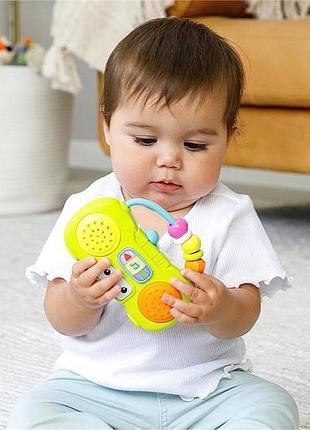 Музыкальная игрушка infantino минипроигрыватель с музыкой и светом