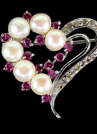 Срібна брошка з натуральним перли, гранатами родолітами та жовтими сапфірами