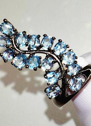 Серебряное кольцо с натуральными небесно-голубыми топазами, размер 18.25