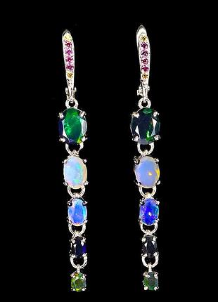 Срібні сережки з натуральними чорними та білими ефіопськими опалами, гранатами родолітами та сапфірами