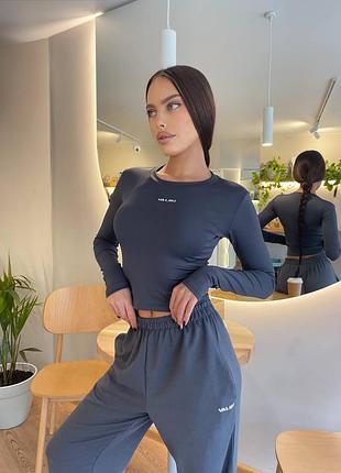 Спортивний костюм жіночий з написом у вигляді логотипу топ з мікродайвінгу та довгим рукавом і штани джогери на резинках з двонитки дуже зручний