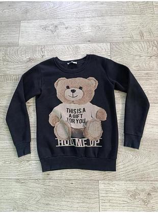 На большом флисе свитшот